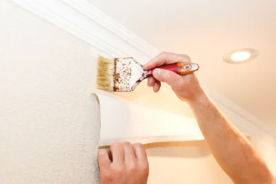 Pose de papier peint au Troncq — revêtements muraux et toiles de verre
